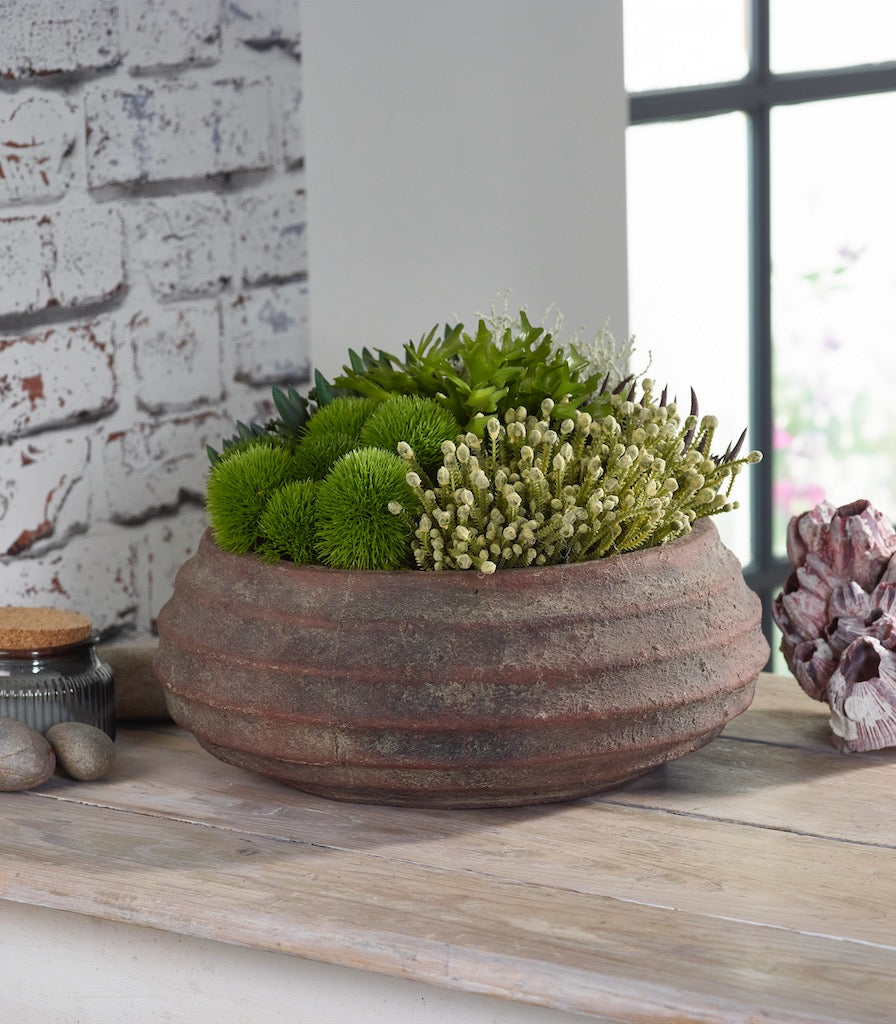 artificial flower arrangements, artificial plants, artificial greenery and artificial trees within the spa breaks and beauty industries.
